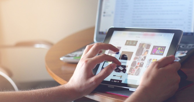 person using tablet

